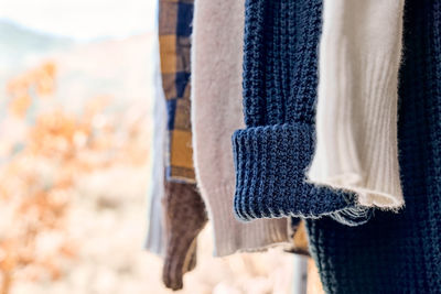 Close-up of clothes hanging on rope