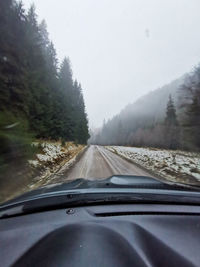 Road seen through car windshield