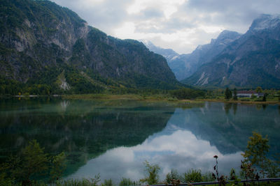 Mountains reflecting on calm lake