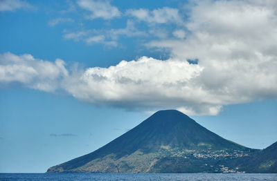 Scenic view of sea against blue sky