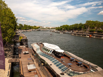 The seine flowing through the center of paris, a beautiful sunny day in paris, the city of love