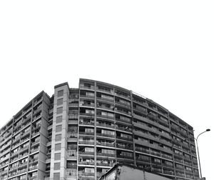 Low angle view of modern building against clear sky