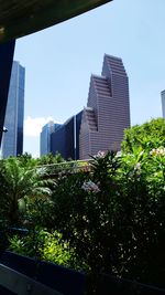 Low angle view of modern buildings against sky