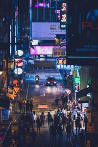 Group of people in city at night