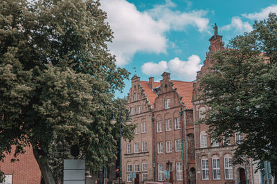 Low angle view of buildings against sky