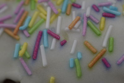 High angle view of multi colored candies on table