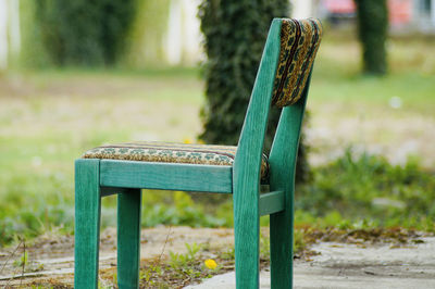 Empty chair in park