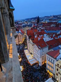 High angle view of illuminated buildings in city