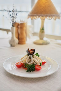 Close-up of fruit salad in plate on table