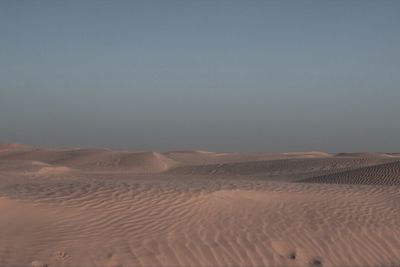 Scenic view of desert against clear sky