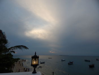 Scenic view of sea against sky at sunset