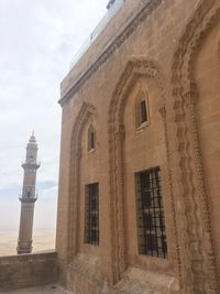 Low angle view of historical building against sky