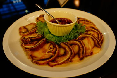 Close-up of served food in plate
