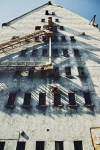 Low angle view of old building against sky