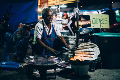 People at market stall