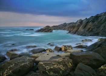 Scenic view of sea against sky during sunset