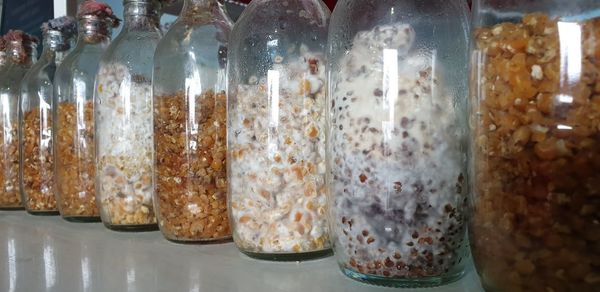 Close-up of glass jar on table