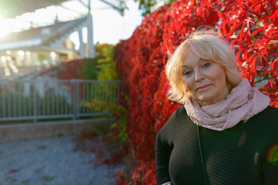 Portrait of smiling mid adult woman outdoors