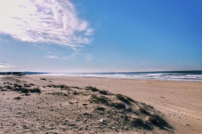 Scenic view of beach against sky