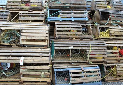 Wood lobster traps piled on top of each other