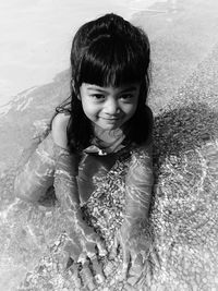 Portrait of girl in shallow water