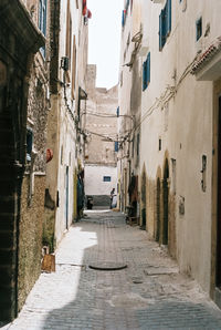 Narrow alley along buildings