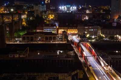 High angle view of illuminated city at night