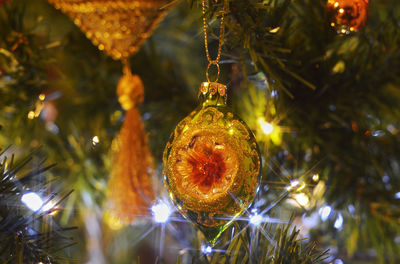 Close-up of christmas decoration hanging on tree
