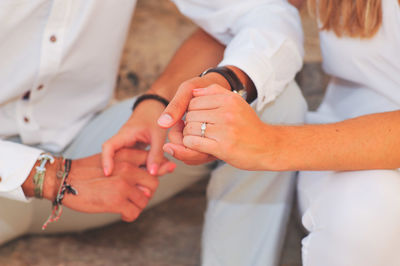 Couple holding hands