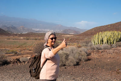 Senior woman hiking at remote location