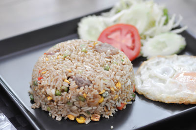 Close-up of served food in plate