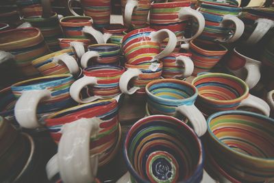 Full frame shot of colorful cups stacks at store