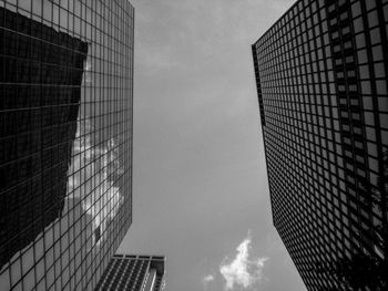 Low angle view of skyscrapers against sky