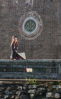 Beautiful woman at the imperial fortress in hue / vietnam