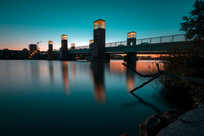 Bridge over river against clear sky