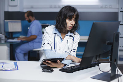 Businesswoman working at clinic