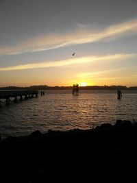 Scenic view of sea at sunset