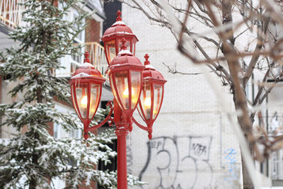 Low angle view of red street lights with a christmas vibe