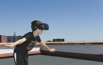 Virtual reality experience young man having a funny moment