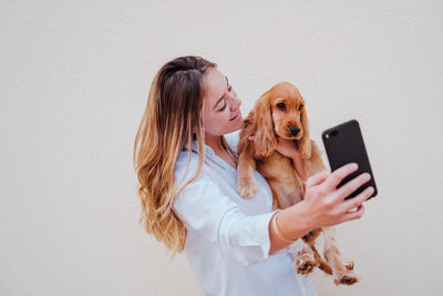 Young woman using smart phone