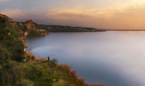 Scenic view of sea against sky during sunset