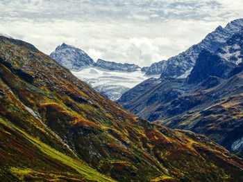 Scenic view of snowcapped mountains and beautiful landscape against sky at austria