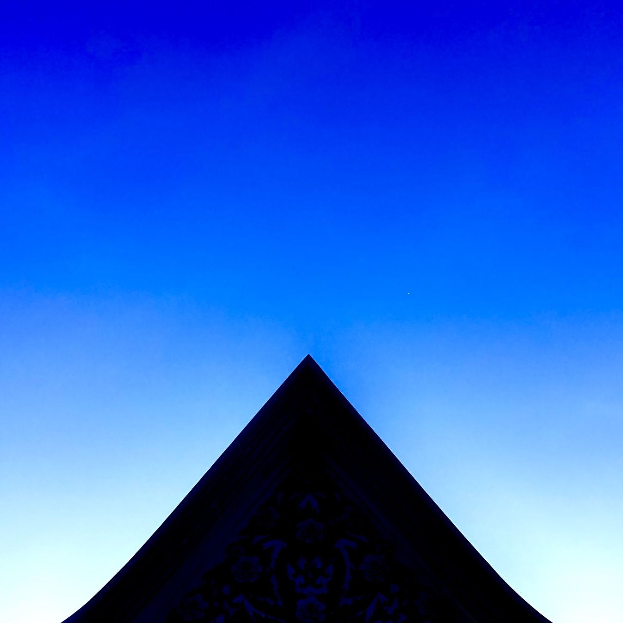 blue, sky, architecture, built structure, triangle shape, no people, horizon, building exterior, low angle view, nature, clear sky, light, sunlight, shape, copy space, dusk, building, travel destinations, history, reflection, outdoors, the past, evening, religion, day