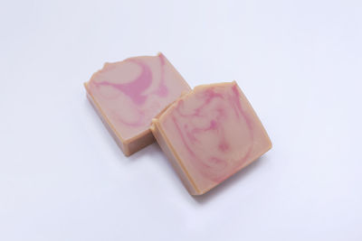 Close-up of heart shape over white background