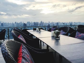 Panoramic view of sea and buildings against sky