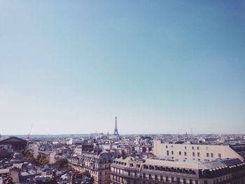 Cityscape against clear sky