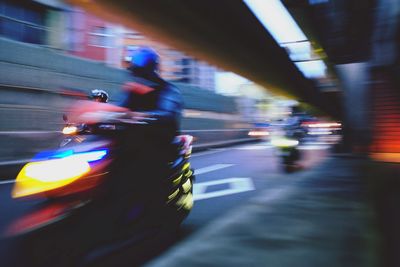 Blurred motion of car on road at night