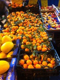 Variety of fruits for sale at market stall