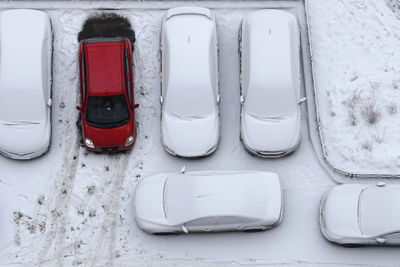 High angle view of frozen cars on road