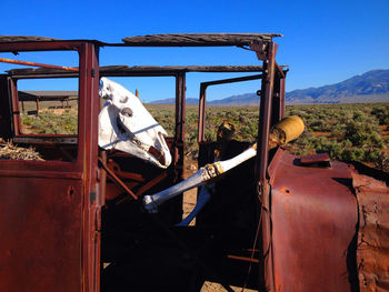 Old car against clear sky